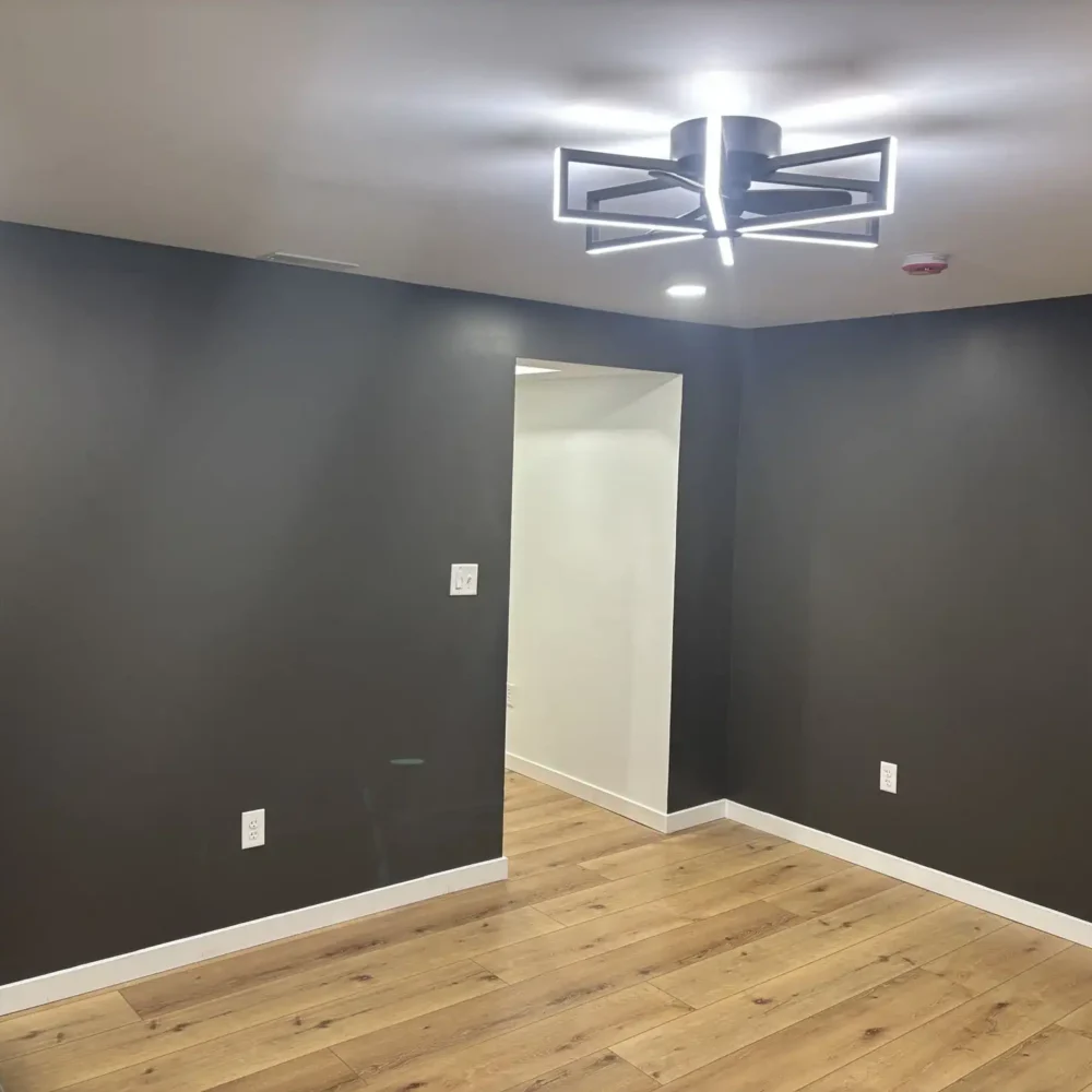 Modern Workout Room with New Abstract Light Fixture